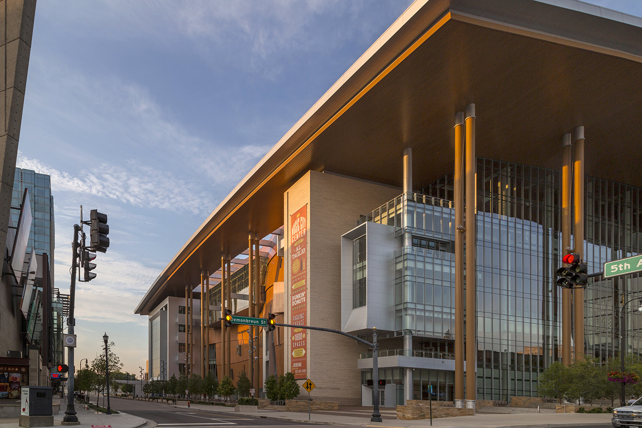 The banner installed on the Music City Center facade, seen in daylight from 5th Avenue